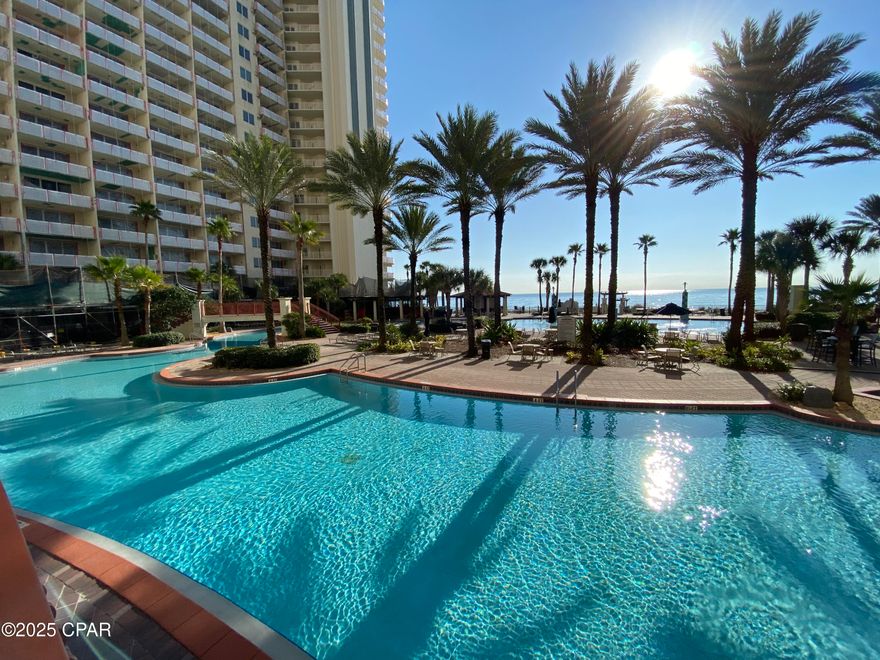 The views from this 23rd floor condo are majestic! When you reach your front door, the eastern views pull you in. It's hard to go inside! Balcony views give you Westerly and South Gulf Views and fabulous views of the dynamic pool area. 
This Top Floor Penthouse unit sleeps 6 and has one full bedroom and bath, bunk room and bath, spacious living room/dining area and modern kitchen. Kitchen has granite countertops, stainless steel appliances, updated cabinets and is fully stocked for the upcoming rental season. Also comes Fully Furnished so turnkey ready to go! 
Lush Landscaping, Dolphin Fountains and pool space galore!  
Shores of Panama is a 23 story Tuscany style condominium. The complex offers amenities including around 500' feet of Gulf frontage, 14k square foot Gulf-side, zero entry gulf side pool, hot tub, heated indoor pool & hot tub, covered on-site parking garage, fitness center, two full-service bars serving lunch and dinner, beach events and rental services, high-speed internet access, and more!
Buyer and Buyers agent to verify all dimensions and anything deemed important.