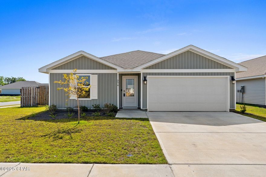 **Seller Financing***  Why Wait to Build When You Can Have Almost New Today! This beautifully designed 4-bedroom, 2-bathroom home in the sought-after Park Place community. With 1550 square feet of living space, this home offers an open and functional layout that blends comfort with style. Step inside to find a spacious open floor plan featuring natural light and bright paint that add to the home's airy feel. The gourmet kitchen is a standout, complete with a large center island, solid surface countertops with breakfast bar, stainless steel appliances, and plenty of counter space—perfect for cooking and entertaining. The kitchen flows seamlessly into the dining and living areas, making it ideal for gatherings and everyday living. The Master suite offers a peaceful retreat with an en suite bath that includes dual sinks and a walk-in closet. The split-bedroom layout ensures privacy, with LVP flooring throughout the main living areas and cozy carpet in all bedrooms. Outside, enjoy a spacious backyard with the added bonus of being fully fenced, giving you added privacy and room to relax or play. Community amenities include a pool, cabana, playground, and green space. Located just minutes from shopping, grocery stores, the World's most beautiful beaches and Tyndall AFB this home combines modern living with everyday convenience.  Being offered with Seller Financing of 6.5% for 30 years w/ a 5-year Balloon don't miss the chance to make it yours!