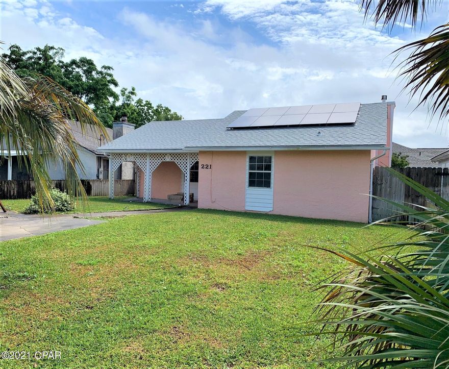 Welcome to 221 Poinsettia Drive, a recently renovated 2 bedroom 2 bathroom home.  Tile flooring throughout, Quartz Counter Tops, new AC system.  Property includes laundry room and oversized shed with electricity.  This home is located in Open Sands community on Panama City Beach, walking distance to the beach with public access just across the street!  Very close to Pier Park, with shopping and restaurants... Will not last long, call today!