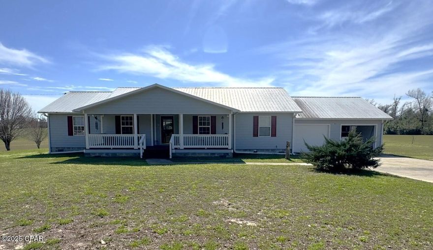 This exceptional three-bedroom, two-bathroom residence sitting on one acre, features a metal roof, wall-to-wall carpet and ceramic tile. Appliances include a stove, refrigerator and dishwasher. The properties exterior boasts Hardie board siding, metal roof, solar panels, central heat and air, complemented by an interior that reflects the meticulous upkeep and immaculate care. A major advantage is the attached 24 x 24 two car garage with extensive storage space within the garage, a comfortable back porch with a sunning view and a rejuvenating hot tub. The biggest bonus is the 24 x 28 workshop complete with electricity and electric roll up door. The yard is beautifully maintained! All measurements are MOL