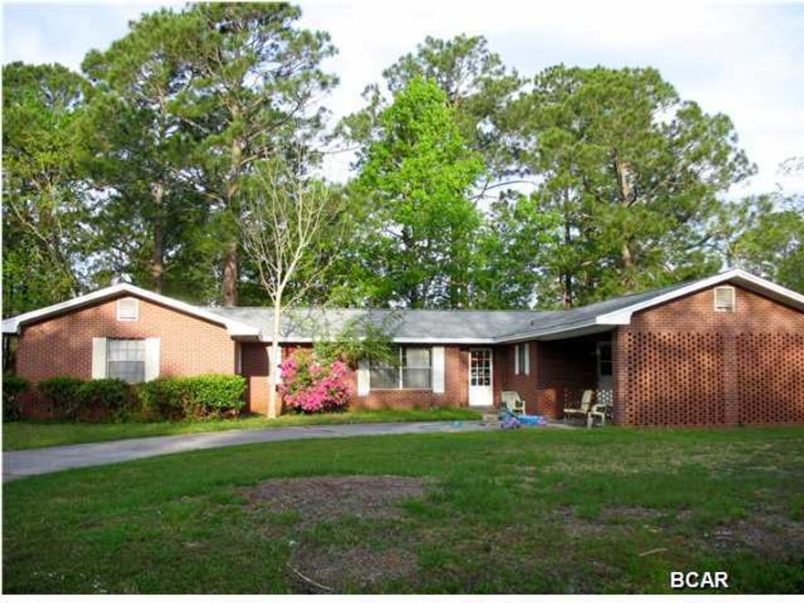 **Desirable Lynn Haven** This 4 bedroom, 2 bath all brick home is located just steps from the bay. It's also convenient to parks and boat launches. The floor plan is open and spacious allowing for a variety of furniture placements. There is newer carpet throughout the house. The roof was replaced in 2014. The home sits on 2 lots located on the corner with a completely fenced in back yard. Schedule your appointment to view this ''Must See'' home!