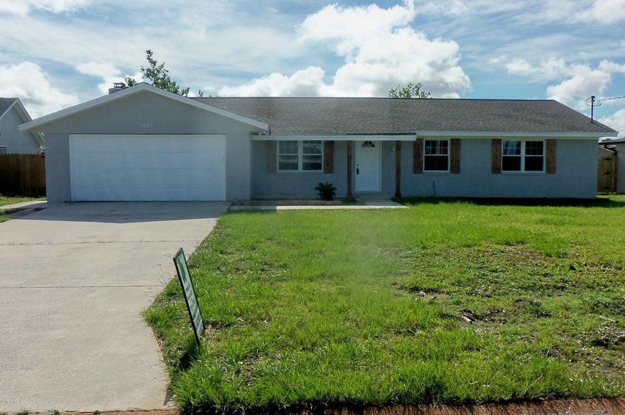 CURRENTLY UNDER CONTRACT -SELLER ACCEPTING BACK UP OFFERS...Brick hearth fireplace in Family Room off kitchen...Freshly painted inside and out...newer tile and fresh carpeted bedrooms. Newer insulated windows and doors. Kitchen and baths updated over the past 5-8 years... Kitchen island and pantry. No current storm damage - new roof 12/2018.

Double (finished) garage with laundry hook ups and sink, covered front entry porch, large 14x20 open rear patio. Nice 12x16 detached wood frame storage building w/wood floor - NEW privacy fencing. Great neighborhood in centrally located Forest Park - Handy to everything - yet quiet. This home is NEAT and CLEAN and ready for immediate occupancy...All this home needs is YOU and YOUR FAMILY! Do not wait to see - Hurry! Yard and Landscaping are a blank canvas - ready for your new ideas!