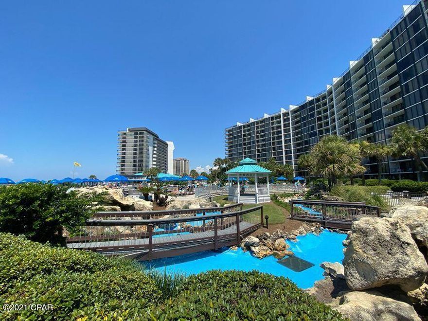 This Edgewater unit has the best floor plan with a floor to ceiling window  the master bedroom which faces the Gulf. The unit has been totally remodeled with new furniture and appliances. Edgewater has wonderful amenitites including the lagoon pool, hot tubs, restaurants, a tiki bar, golf course,  and much more!  Located in the center of the beach, you are close to all the restaurants and attractions of Panama City Beach! The art work, a table with an anchor shape and a glass table with a palm tree in the bedroom don't covey.