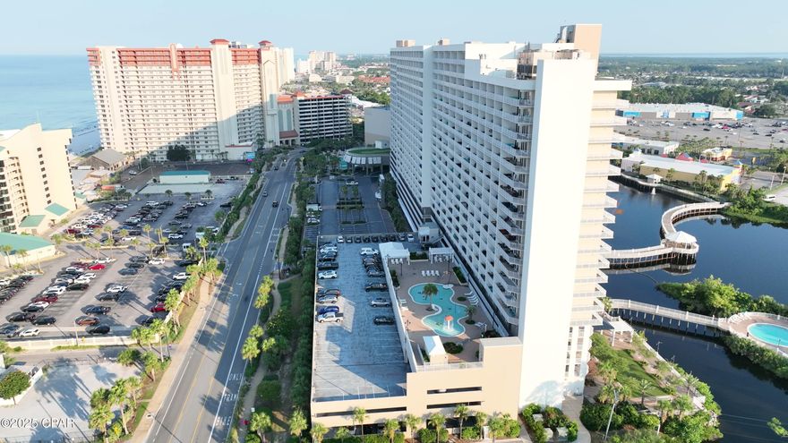 Laketown Wharf #431, a beautifully furnished 3-bedroom, 2-bath condo with breathtaking views and a prime location in the heart of Panama City Beach. From your private, lake-facing balcony, you can enjoy many quiet times. 
This spacious condo comes with new stainless steel appliances and is fully furnished and turnkey ready, making it ideal as a second home, vacation getaway, or investment property. All you need to bring are your sandals and sunscreen!
Laketown Wharf offers resort-style amenities, including three sparkling pools, a full fitness center, a coffee bar, and several onsite restaurants. Just across the street from iconic Pineapple Willy's, you're also surrounded by premier dining, golf, shopping, entertainment, and family-friendly attractions.
Don't miss your chance to own a piece of paradise. Come see #431 today—your beach life starts now!