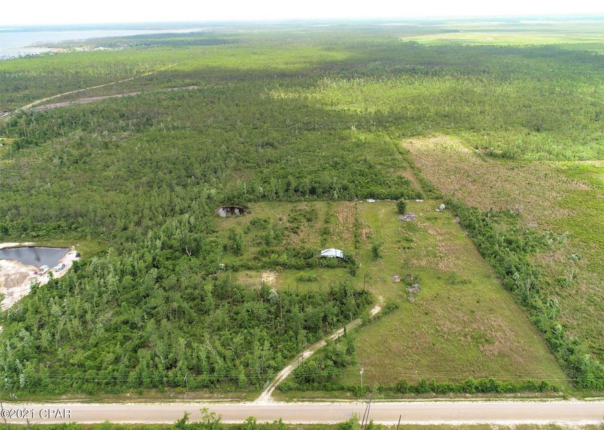 Great opportunity to own acreage close to town, very few 15-acre parcels that are high and dry. This large parcel would offer privacy for an individual owner. The property is close to Eastern Ship Building and has water and sewer at the road. The property is zoned residential and could offer shipyard housing. Also has no deed restrictions and the property is partially cleared.