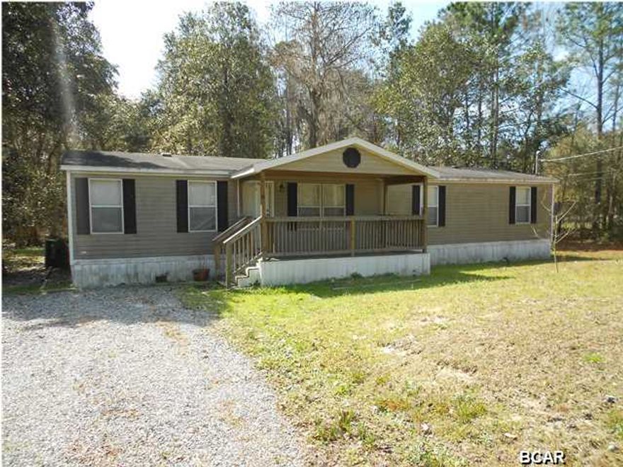 * BANK OWNED * LAND HAS OVER AN ACRE.3-BR-2-BA DOUBLE WIDE WITH SCREEN PORCH AND OUT BUILDING. SOLD AS IS WITH NO FINANCE CONTINGENCIES