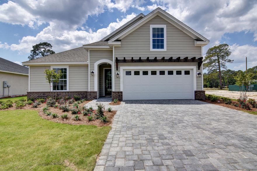 Brand New Arthur Rutenberg Home in the Plantation at College Point offering green space and a playground. This stunning home with hardwood floors, granite countertops and lots of upgrades features a well thought out floor plan for great times and relaxation.  Beautiful inside and out, the home is thoughtfully conceived from its open living areas to its ultra-private master suite and spacious upstairs bonus room.  You will love the kitchen with plenty of elegant and efficient cabinet space; the latest GE Stainless Steel appliances and a giant island.