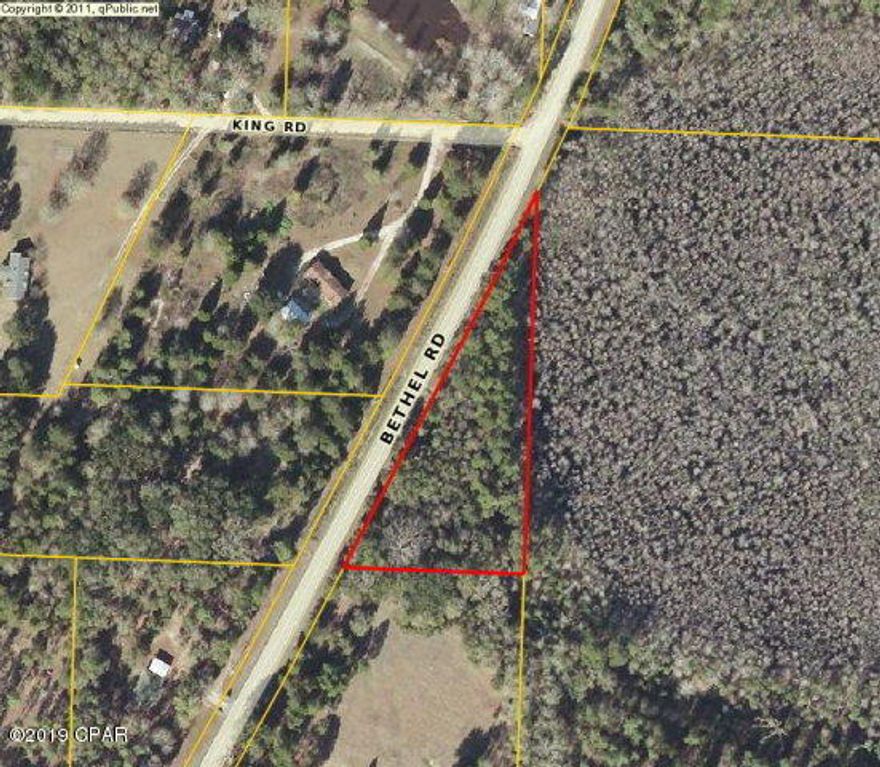 1.5 Acres.  Wooded. Easy to clear. Great homesite. Lots of frontage on county paved road. Short distance to town. Nice and quiet area. No restrictions. Great ready for a new home.