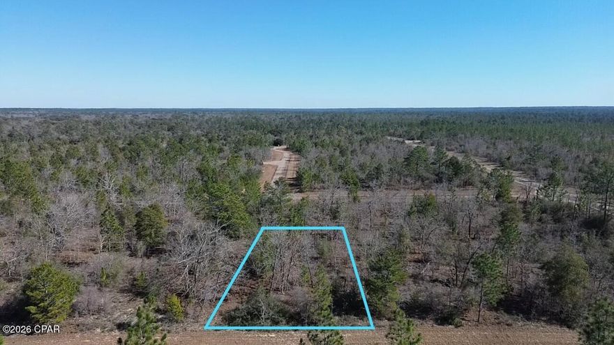 Discover the perfect canvas for your Florida lifestyle on this spacious 0.229-acre parcel in the desirable Sunny Hills community in Chipley, FL. Nestled in a peaceful, growing subdivision, this level lot offers ample space to design and construct your ideal single-family home, with room for outdoor living, gardening, or future expansions.

Sunny Hills is a golfer's and nature lover's paradise, featuring an acclaimed 18-hole golf course at Sunny Hills Golf Club with wide fairways and large greens that provide enjoyable play for all skill levels. Residents enjoy access to a scenic boat lake, a swim park, multiple additional lakes ideal for fishing or swimming, and community parks for relaxation and recreation.

The community is experiencing exciting growth, with multiple reputable builders actively constructing new homes, bringing fresh energy and modern residences to the area. Convenience is at your doorstep with a Dollar General market right at the entrance of one of the main boulevards, making everyday errands effortless.

Location is unbeatable: Just 30 minutes from the charming city of Chipley for shopping, dining, and services, and under an hour's drive to the stunning white sands and emerald waters of Panama City Beach perfect for weekend getaways or day trips to the Gulf Coast.

Whether you're seeking a peaceful retreat surrounded by natural beauty or a vibrant community with endless outdoor amenities, this lot in Sunny Hills offers the ideal blend of tranquility, recreation, and convenience. Don't miss your opportunity to secure a piece of Florida Panhandle paradise.