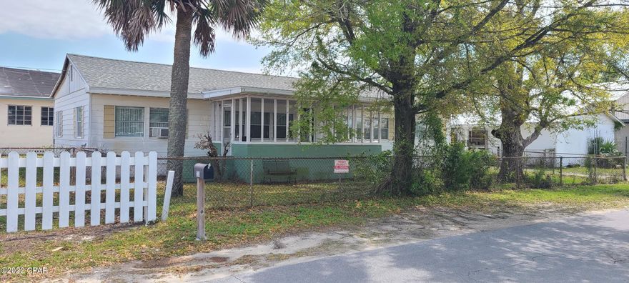 Property was just rezoned to St Andrews Downtown District which allows commercial parking in city parking across the street. Great opportunity for a home in the heart of St Andrews with a warehouse. The possibilities are endless within this .26 acre parcel. The main home is almost 2200 square feet and can be a great AirBnB property or retail. The warehouse is a cinder block building 1675 sq feet in total that can also be converted back to a duplex or continued use for storage.