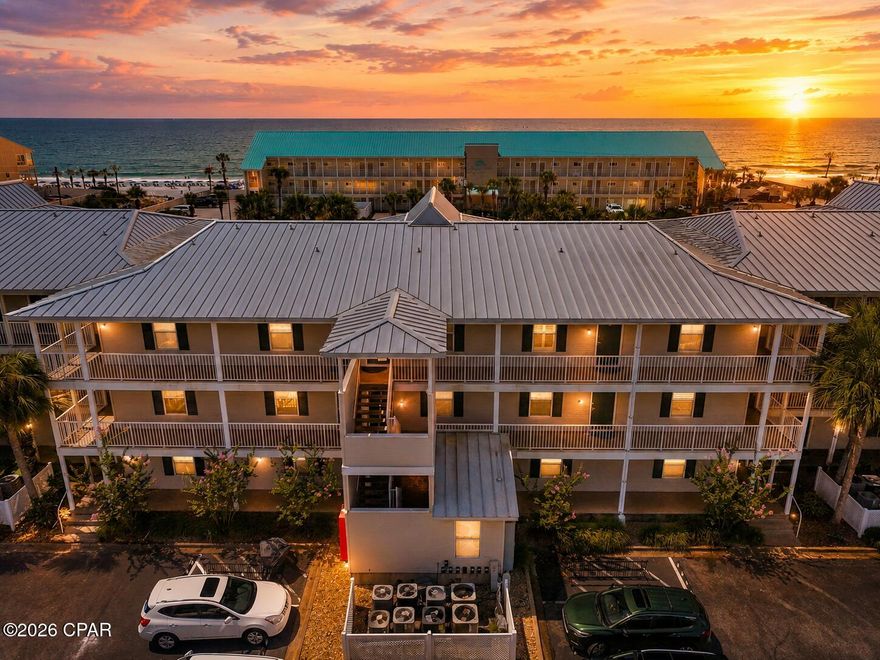 Welcome to your turnkey beach escape at Grand Caribbean West. Perched on the desirable top floor, this spacious 1-bedroom, 1-bathroom condo perfectly blends coastal charm with smart, income-generating design. The open living and dining area flows seamlessly to a large private balcony perfect for taking in the coastal scenery and Gulf breezes. Inside, you'll find standout features that maximize comfort and rental revenue, including a rare-for-the-area full-size kitchen, built-in hallway bunk beds for extra guest capacity, and the ultimate convenience of an in-unit washer and dryer. 
This pristine unit offers total peace of mind with extensive recent updates, including luxury tile flooring throughout, an updated bath with a newer tub and toilet, a 2019 HVAC system, a 2021 hot water heater, and the popcorn ceiling completely removed in 2022. Located directly across from the beach, you get the best of both worlds--beautiful Gulf views with the added security of not being directly on the sand. Grand Caribbean West provides excellent community amenities, including a sparkling pool, hot tub, grilling area, and a picnic pavilion. Whether you're looking for a high-performing vacation rental, a second home, or a cozy beach retreat, this unit is completely move-in ready in a prime Destin location. All information is deemed accurate but should be verified by the buyer and/or buyer's agent if important. Schedule your private showing today!
