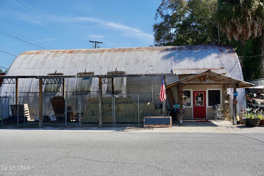 Prime Downtown Chattahoochee Commercial Property - Turnkey Hardware Store Opportunity!  Don't miss this rare chance to own a 2400 sq. ft. commercial property in the heart of downtown Chattahoochee, perfectly situated across from City Hall. This historic Quonset hut is currently operating as a longstanding hardware store, offering both a thriving business and a solid investment in a high-visibility location.

The sale includes all existing inventory, making it a turnkey opportunity for an entrepreneur ready to step into ownership—or for an investor looking to reimagine the space for retail, office, or mixed use.

The building includes spacious 2400 sq. ft. interior with flexible layout possibilities. An additional 750 square feet of covered outside space. There is ample public parking nearby and the business is located in a prime downtown location for visibility and foot traffic. 

Whether you continue the hardware business or transform the space for a new venture, this property offers location, history, and potential in one package.