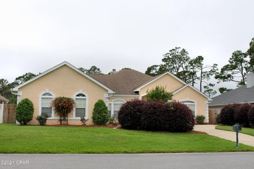 Pelican Bay is located off of Magnolia Beach Road and is a quiet deed restricted waterfront residential neighborhood with the following community features; clubhouse, pool, hot tub, dock and nature trails.  This home features three bedrooms; two full baths; one ½ bath; family room; living room; dining room; kitchen with breakfast bar and eat in area; laundry room; garage; huge covered patio; privacy fenced yard; and plenty of privacy.  Property has open concept a split floor plan with high ceilings.  Home has been well maintained.