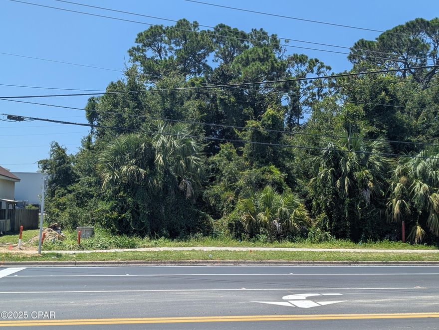 Commercial lot on middle beach road next to Panama City Beach Fire Station and backs up to the Wall-mart ahopping Center.  Vwey heavy traffic on Middle beach and can be seen from Wall Mart parking lot. Within walking distance of Mcdonalds and beaches.. Zoned commercial and waiting for your design