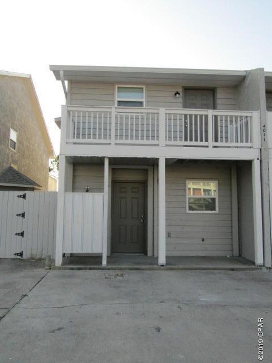 Remodelled 2 bedroom, 2 bath townhome. Home features new LVP flooring, new appliances and new cabinets. Downstairs features living/dining combo,	full bath with shower, kitchen and laundry area. Upstairs features 2 bedrooms, Jack and Jill bathroom, balcony off front and deck off back. Open patio leads to fenced back yard. Property is on septic system. Lawn service included. Exterior shower. **$250 pet deposit/$50 pet fee/$25 month pet rent.