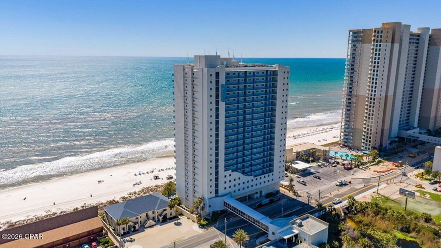 Wake up to calming, elevated views of the Gulf and the resort-style pool from this polished 4th-floor 1BR/2BA + bunk condo at Sterling Breeze. The lower floor places you closer to the sugar-white sands and emerald waters while overlooking the pool, creating a more immersive beach experience with easier access to amenities. Inside, the unit is exceptionally well appointed with tile flooring throughout, tiled showers, granite countertops and designer furnishings. Additional conveniences include in-unit laundry, secure covered garage parking, and access to on-site amenities such as a fitness center and lounge areas. Offered fully furnished and turnkey, it's ideal for personal enjoyment, a second home, or rental income. Perfectly positioned close to Pier Park, Top Golf, restaurants and more.