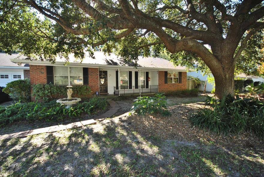 This is a Beautiful home in the Woodlawn subdivision. This home features a spacious floor plan, the family room offers vaulted ceilings with a fireplace and tile floors. The garage has been converted into a family/ bonus room enclosed with central heating and cooling ducts but can be easily converted back to a garage as needed in no time. An office/workout/ additional bedroom was added on that overlooks the unbelievable back yard. The master bedrooms is spacious and master bath has a seperate tile shower. Two master closets with racks and baskets for great organization and space! The back yard is like a Tropical Island paradise with in-ground pool, separate workshop with full electric also with added craft room that can also be used as a green house. Furthermore this home has a 14x28 in-ground pool was resurfaced in 2009, Also in the back yard you will find a tiki bar for entertaining. This home is priced to sell so if you are looking for a for home on the beach with a pool this is the home for you!