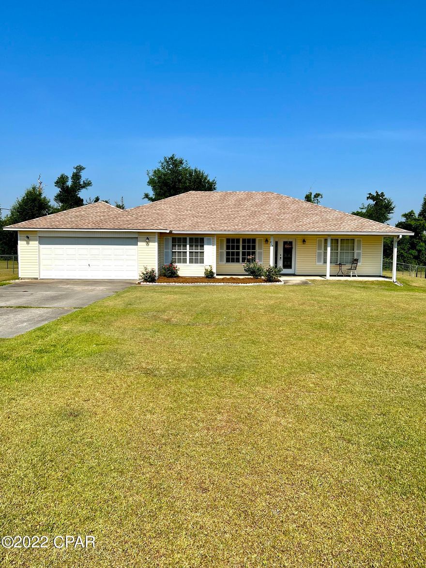 That perfect home you're family has been searching for has finally surfaced!  Thoughtfully designed and meticulously maintained, this 1695 square foot 3/2 single family home offers a split floor plan, spacious bedrooms, and plenty of indoor and outdoor living space.  The house was built on its huge 2 acre lot in 2004.  There was no major hurricane damage but the roof was promptly replaced after the storm.  This home's rural neighborhood, family oriented and quiet, is conveniently situated a short distance off of Hwy 71 South about 8 miles from I-10, shopping, and restaurants in Marianna.  A quick 1.2 mile drive will land you at the Chipola River.  It won't last long so book a tour today and lock it in!