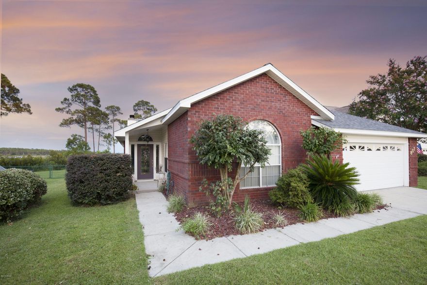 This gorgeous 3/2, split bedroom home has a brand new roof and is located in the popular Plantation Point neighborhood. Living room has a fireplace and overlooks the formal dining room and a large enclosed Florida room. Kitchen features an eat in breakfast nook with bay window, removable island, ample cabinetry, and a pass through into the FL room. Master bedroom offers trey ceiling, remodeled master bath with walk in closet, tile floors, double vanity, jacuzzi tub, and separate shower. There is a large laundry room with cabinetry and pantry storage. Guest bath has been remodeled. The large backyard is private, no neighbors behind you with a marsh that leads to the Bay. Flood insurance is minimal at $690/year. Complete with a workshop and large screened porch. All sizes approx!