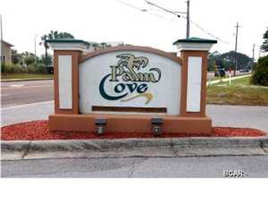 This is the Private Residential Gated Community of Palm Cove here in Panama City Beach and is close to the emerald green Gulf and our world famous sugar white sandy beaches. This three bedroom, two bath home has 1350 Sq. Ft. with a single car garage and parking for two in the driveway. There is a front porch and a screened in back patio. There are two community swimming pools and one of those is a salt water pool. The Home Owners Association maintains the pools and the landscape around your home. Wow, no grass cutting giving you plenty of time to enjoy yourself. The home has an open floor plan. In the fully furnished kitchen you will still have complete contact with everyone in the eating area and the family room. Don't worry about spills because the area from the front door through