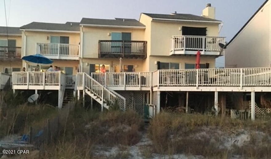 Rare Gulf Front Townhome on the west end with no HOA!  Walk from the deck right onto the sugary sands and enjoy the spectacular views from the deck.  Beautiful, well kept family owned 2 bdrm, 2 bath property right on the Gulf.  Must see!!!!