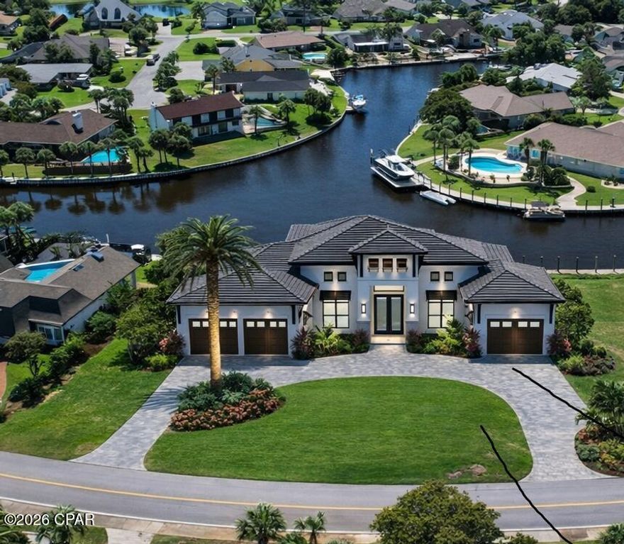 Rare opportunity to own a stunning waterfront homesite in the highly sought-after gated community of Bay Point in Panama City Beach. Perfectly positioned along the canal with direct access to the Grand Lagoon and Gulf, this spacious lot offers the ideal setting to design and build your custom coastal home.

Enjoy beautiful water views, gentle breezes, and the ultimate Florida lifestyle right from your backyard. The seller has recently installed a new vinyl seawall and pylons, offering added value and peace of mind for future construction and boating. In addition, the seller has stunning house plans in hand for a thoughtfully designed 3,400 sq. ft. residence, giving buyers a head start on creating their dream waterfront home.
A conceptual rendering for illustrative purposes will be shown in photos of this property. 
With ample space to accommodate a private dock, outdoor living areas, and a custom residence, this property provides endless possibilities for creating a luxury coastal retreat.

Located within Bay Point, a premier gated golf cart-friendly community, residents enjoy access to world-class amenities including a championship golf course, marina, tennis courts, and 24-hour security. Conveniently situated just minutes from beaches, dining, shopping, and St. Andrews State Park.

Whether you're looking to build a full-time residence, second home, or investment property, this exceptional lot offers both location and lifestyle. Don't miss this chance to secure one of the few remaining waterfront lots in Bay Point.