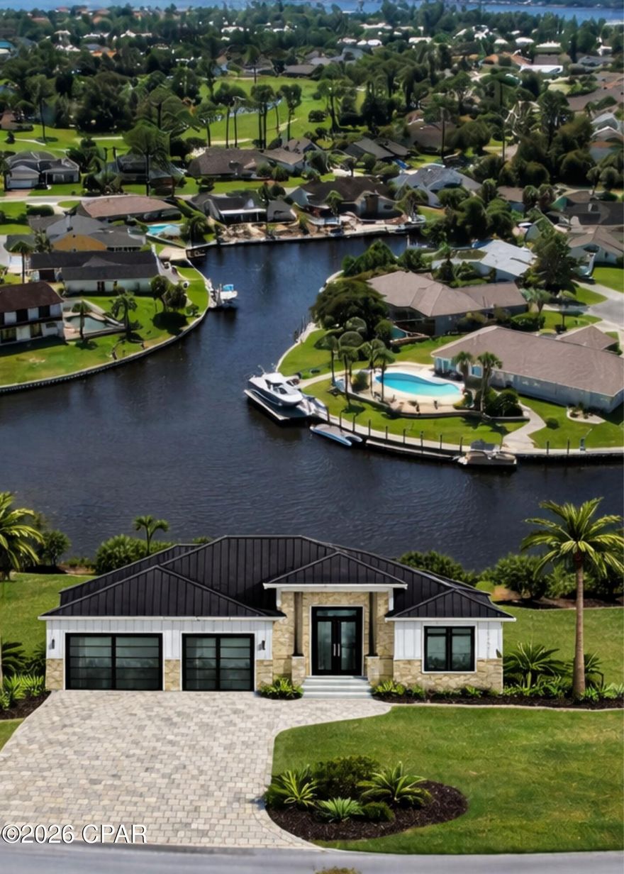 Rare opportunity to own a stunning waterfront homesite in the highly sought-after gated community of Bay Point in Panama City Beach. Perfectly positioned along the canal with direct access to the Grand Lagoon and Gulf, this spacious lot offers the ideal setting to design and build your custom coastal home.

Enjoy beautiful water views, gentle breezes, and the ultimate Florida lifestyle right from your backyard. The seller has recently installed a new vinyl seawall and pylons, offering added value and peace of mind for future construction and boating. In addition, the seller has stunning house plans in hand for a thoughtfully designed 3,400 sq. ft. residence, giving buyers a head start on creating their dream waterfront home.
A conceptual rendering for illustrative purposes will be shown in photos of this property. 
With ample space to accommodate a private dock, outdoor living areas, and a custom residence, this property provides endless possibilities for creating a luxury coastal retreat.

Located within Bay Point, a premier gated golf cart-friendly community, residents enjoy access to world-class amenities including a championship golf course, marina, tennis courts, and 24-hour security. Conveniently situated just minutes from beaches, dining, shopping, and St. Andrews State Park.

Whether you're looking to build a full-time residence, second home, or investment property, this exceptional lot offers both location and lifestyle. Don't miss this chance to secure one of the few remaining waterfront lots in Bay Point.