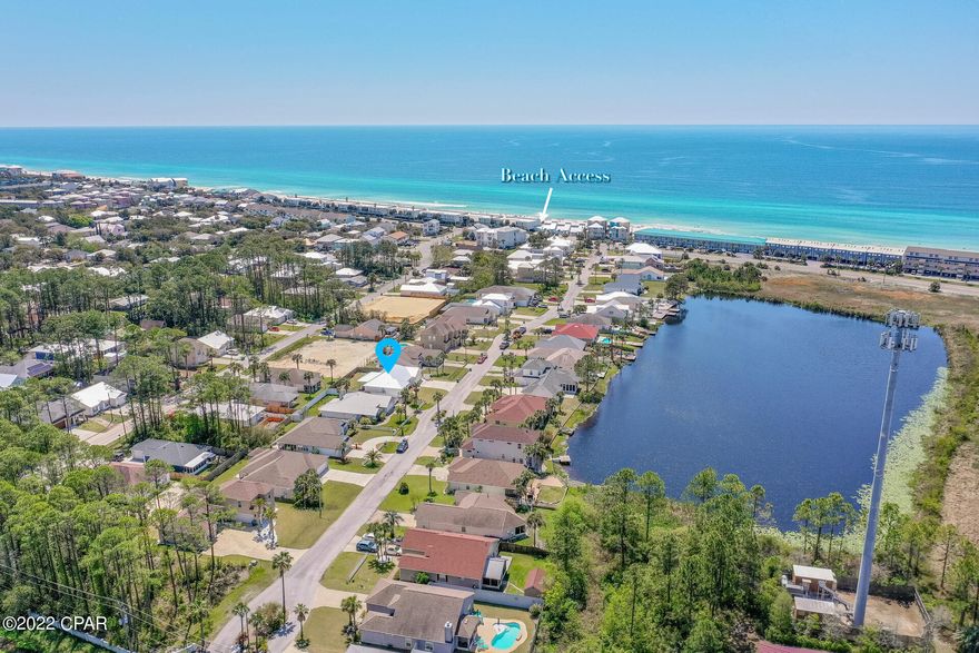 Ready to live on the West End of Panama City Beach, in a Gated Community and so very close to the Gulf of Mexico? Then you are in luck with this one owner custom built home. Featured is an open floor plan, Luxury Plank Vinyl flooring throughout to make for a seamless flow, kitchen with custom soft close cabinets, quartz countertops, deep sink & 6 burner gas cook top/electric oven $6000 stove, off the wide hallway is a pantry and a large laundry room with utility sink & cabinets. Then it's time to take the PARTY out back to the large 21x12 covered patio connected to even more patio with your own, new Hot Tub which will stay ready for you to enjoy. Privacy fence and sprinkler system for the lawn complete the outside living.