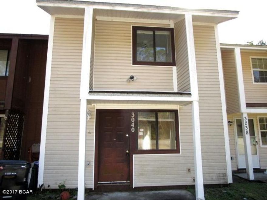 CENTRALLY LOCATED AND AFFORDABLE TOWNHOME READY FOR NEW OWNERS!  This two-story townhome has been upgraded with all-vinyl siding and features a living room with laminate flooring and ceramic tile in the dining and kitchen.  The galley-style kitchen with a large-walk in pantry includes all appliances.  The two bedrooms are upstairs are a good size with a full bath adjoining the Master bedroom.  The dining area has a glass-sliding door to a deep yard with a storage building.  Home is being sold in its AS IS condition.