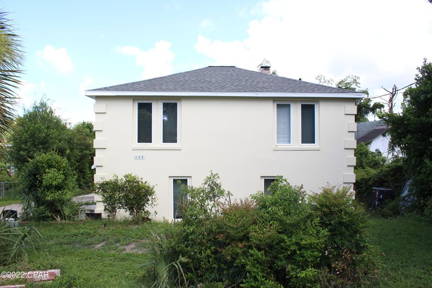 Incredible opportunity on Watson Bayou. This property was set up for two rentals and that is still a possibility. Could be an awesome rehab, to 3 bedrooms and two bathes. Home has yesterday charm and character, needs some one to update. Home  also has a dock and boat house.  This property is waiting for a new owner that sees the future possibilities.