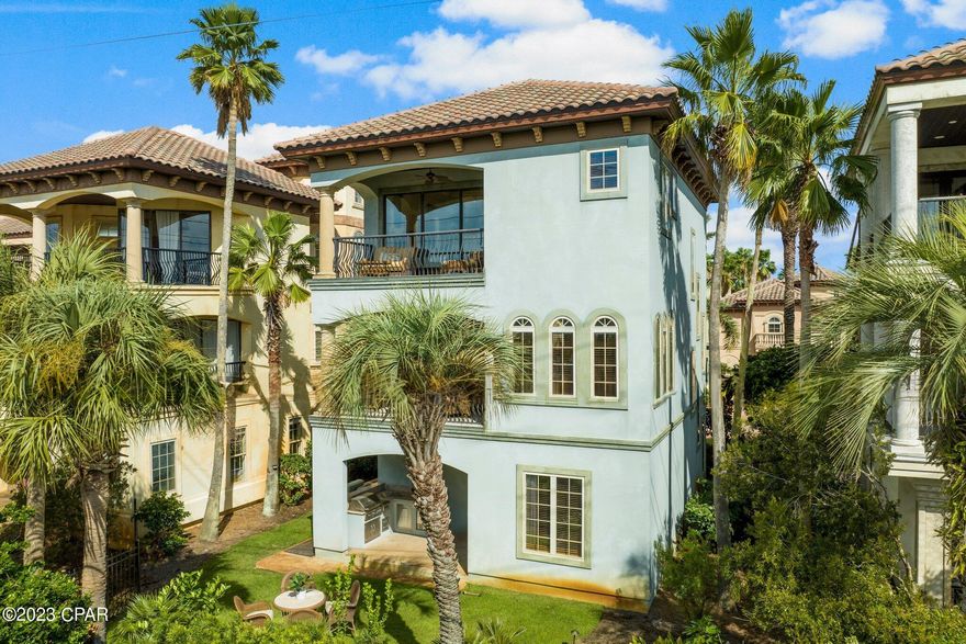 Welcome to the luxurious 'Blue Mediterranean Villa '' in the enchanting Saint Tropez community, a Mediterranean-Tuscan oasis nestled in the heart of Miramar Beach, Florida. This exquisite 3-story residence offers a deluxe Grand Master Suite with floor-to-ceiling glass doors that open to a spacious balcony, revealing breathtaking views of the Gulf of Mexico. The third floor also boasts a Second Master Bedroom with a large window. Generously sized Guest Bedroom is also available on the ground floor with beautiful french doors for direct access to the outdoor living space. The second level is a perfect hub for fun gatherings, featuring an open living and dining area that seamlessly connects to a well-appointed kitchen with granite countertops, a Sub-Zero refrigerator,

and top-of-the-line Dacor appliances. The living and dining area extends to a large second-floor balcony, where you can relish panoramic views of swaying palm trees and refreshing Gulf breezes. The ground level offers a stunning summer kitchen equipped with a gas grill and ice machine, all opening up to a meticulously maintained backyard with lush green grass, citrus trees, and towering palm trees, promising the ultimate tropical experience. This charming home also offers a welcoming foyer with a cozy sitting area, a spacious ground floor laundry room, ample storage space for your beach essentials, an oversized one-car garage, and an outdoor shower.

Begin your days with morning coffee or indulge in afternoon tea while witnessing some of the most mesmerizing sunrises and sunsets the Emerald Coast of Florida has to offer. Whether you seek a vacation retreat or an investment property, the ''Blue Mediterranean Villa'' is an absolute must-see for those looking to make their mark on the Emerald Coast real estate scene.

Saint Tropez is an exclusive, gated community boasting 31 Mediterranean villas and deeded beach access. Located on the east end of Scenic Highway 98, its cobblestone streets and picturesque pathways, framed by lush landscaping and royal palm trees, lead to an oversized lagoon pool complete with fountains, a Jacuzzi, bathrooms, and an outdoor shower.

Conveniently situated less than a mile from the renowned Silver Sands Outlet, 2 miles from the vibrant Baytowne Wharf and Sandestin Resort's Golf Courses, and a mere 3.2 miles from the diverse shopping and dining options at Grand Boulevard and Sacred Heart Hospital, the ''Blue Mediterranean Villa'' offers access to all the area's delights. A short golf cart or vehicle ride will whisk you along the picturesque Miramar Beach coastline, where beachfront restaurants and shops await your exploration.

Don't miss the chance to experience this coastal elegance. Schedule your private tour today and embark on a journey to your dream home in paradise.

Please note that while every effort has been made to provide accurate information, we recommend that both the Buyer and Buyer's Agent confirm all essential details. Welcome to the luxurious 'Blue Mediterranean Villa '' in the enchanting Saint Tropez community, a Mediterranean-Tuscan oasis nestled in the heart of Miramar Beach, Florida. This exquisite 3-story residence offers a deluxe Grand Master Suite with floor-to-ceiling glass doors that open to a spacious balcony, revealing breathtaking views of the Gulf of Mexico. The third floor also boasts a Second Master Bedroom with a large window. Generously sized Guest Bedroom is also available on the ground floor with beautiful french doors for direct access to the outdoor living space. The second level is a perfect hub for fun gatherings, featuring an open living and dining area that seamlessly connects to a well-appointed kitchen with granite countertops, a Sub-Zero refrigerator,

and top-of-the-line Dacor appliances. The living and dining area extends to a large second-floor balcony, where you can relish panoramic views of swaying palm trees and refreshing Gulf breezes. The ground level offers a stunning summer kitchen equipped with a gas grill and ice machine, all opening up to a meticulously maintained backyard with lush green grass, citrus trees, and towering palm trees, promising the ultimate tropical experience. This charming home also offers a welcoming foyer with a cozy sitting area, a spacious ground floor laundry room, ample storage space for your beach essentials, an oversized one-car garage, and an outdoor shower.

Begin your days with morning coffee or indulge in afternoon tea while witnessing some of the most mesmerizing sunrises and sunsets the Emerald Coast of Florida has to offer. Whether you seek a vacation retreat or an investment property, the "Blue Mediterranean Villa" is an absolute must-see for those looking to make their mark on the Emerald Coast real estate scene.

Saint Tropez is an exclusive, gated community boasting 31 Mediterranean villas and deeded beach access. Located on the east end of Scenic Highway 98, its cobblestone streets and picturesque pathways, framed by lush landscaping and royal palm trees, lead to an oversized lagoon pool complete with fountains, a Jacuzzi, bathrooms, and an outdoor shower.

Conveniently situated less than a mile from the renowned Silver Sands Outlet, 2 miles from the vibrant Baytowne Wharf and Sandestin Resort's Golf Courses, and a mere 3.2 miles from the diverse shopping and dining options at Grand Boulevard and Sacred Heart Hospital, the "Blue Mediterranean Villa" offers access to all the area's delights. A short golf cart or vehicle ride will whisk you along the picturesque Miramar Beach coastline, where beachfront restaurants and shops await your exploration.

Don't miss the chance to experience this coastal elegance. Schedule your private tour today and embark on a journey to your dream home in paradise.

Please note that while every effort has been made to provide accurate information, we recommend that both the Buyer and Buyer's Agent confirm all essential details.