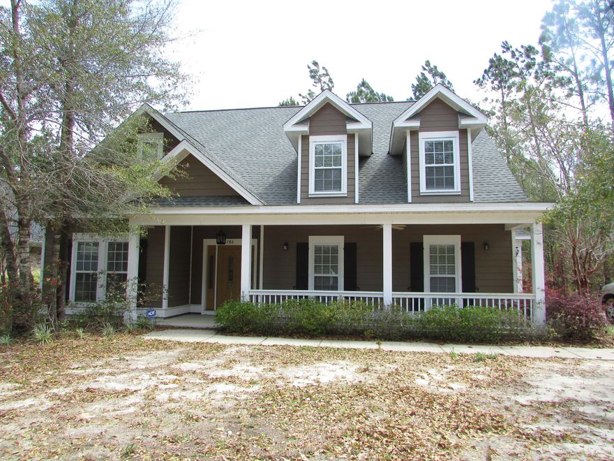 Gorgeous Home located in Symphony at Hammock Bay in Freeport Florida. Only 15 Miles to Santa Rosa Beach and 30 Miles to Destin Florida. Located in Hammock Bay 3000 acre Community. With a Subdivision with so many amenities sits this 5 Bedroom 3 Bath 2 story home with 3,324 sq. ft. under AC!! Granite counter tops in the Kitchen and bathrooms. The kitchen boasts upgraded Cabinets, Stainless Steel Appliances, gas stovetop, wall oven, refrigerator with ice maker. There is a breakfast area plus a formal dining room. The large Open floor plan offers a huge Living area overlooking the covered patio & backyard! The master bedroom and 2 additional rooms are on the first floor. There are 2 additional rooms on the second floor with their own bath. There is hardwood and tile floors thru out the first There is hardwood and tile floors thru out the first floor. All Bedrooms have carpeting!  The attached 2 car garage has a central vacuum system and will fit 2 vehicles in perfectly.  The Community offers so much that you may never want to leave with network of sidewalks, nature trails, and bike paths will most certainly lead you to a place of interest .  Hammock Bay Town Square (lawn-style amphitheater for entertainment, boutique commercial space for on site conveniences), Freeport City Sports Park at Hammock Bay (a 60-acre sports park featuring a multitude of ballfields/park amenities), The Lake Club at Hammock Bay - lap & resort pools, tennis, putting green, massive playground, basketball, meeting/functions facility, caterer's kitchen, 6000 sq. ft. clubhouse with movie theatre), The Fitness Club at Hammock Bay(4000 sq. ft. state-of-the-art fitness facility), the Bay Club at Hammock Bay, located on 480 ft. of pristine shoreline alongside the Choctawhatchee Bay, or the Pet Park at Hammock Bay, for the opportunity to enjoy a protected outdoor environment with your furry friends! Buyer to verify general information, community covenants & restrictions, architectural review board guidelines. Call today for your personal showing.