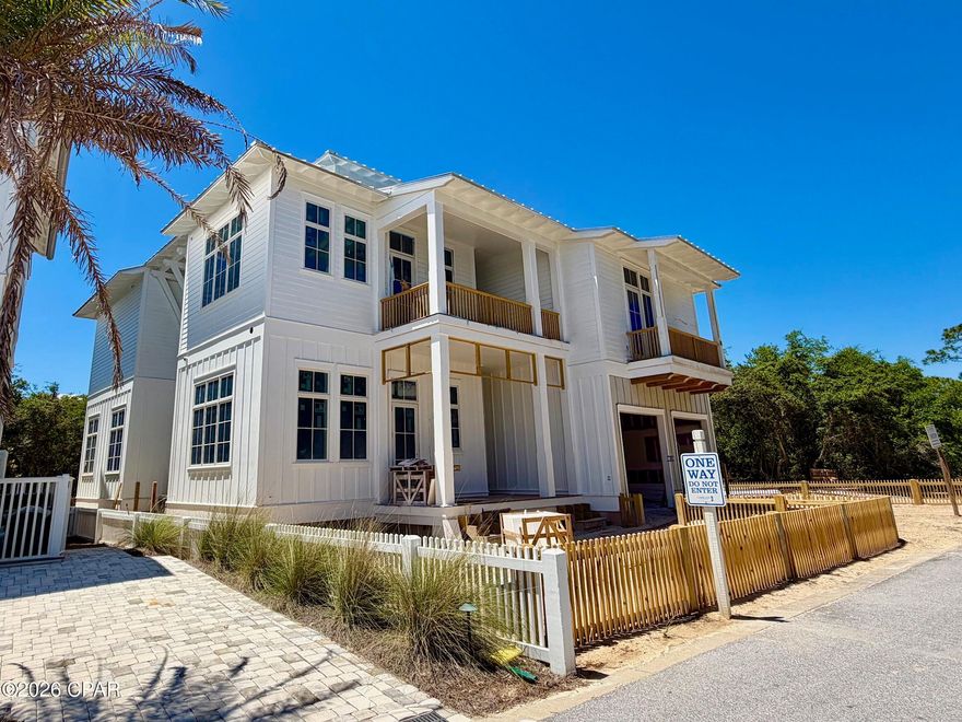 Experience coastal luxury in the exclusive, gated Carillon Beach gulf front community along Florida's renowned Scenic 30A corridor. This newly constructed 4-bedroom, 4.5-bath residence offers a seamless blend of elegance, comfort, and modern resilience--built to meet current Dade County hurricane standards for peace of mind.  Upgraded finishes and appliances are featured throughout the home.

Designed for both relaxation and entertaining, the home features a double garage, two spacious lanais, two living spaces, and a  tower that showcases breathtaking panoramic views of the Gulf and Lake Powell--the largest coastal dune lake in the United States. There is space to add a pool if you so desired.  Enjoy effortless beach access along with the charm of a vibrant town center filled with boutique shops, local eateries, a fitness center, and pilates studio.

Residents benefit from an array of resort-style amenities, including multiple pools, playgrounds, and courts for tennis, pickleball, and basketball--creating the perfect balance of leisure and activity in one of the Florida Panhandle's most sought-after beachfront communities.

Construction is well underway and the home is expected to be completed by late summer 2026.

Don't miss the opportunity to make this home your vacation home, an investment property, or your full time residence.