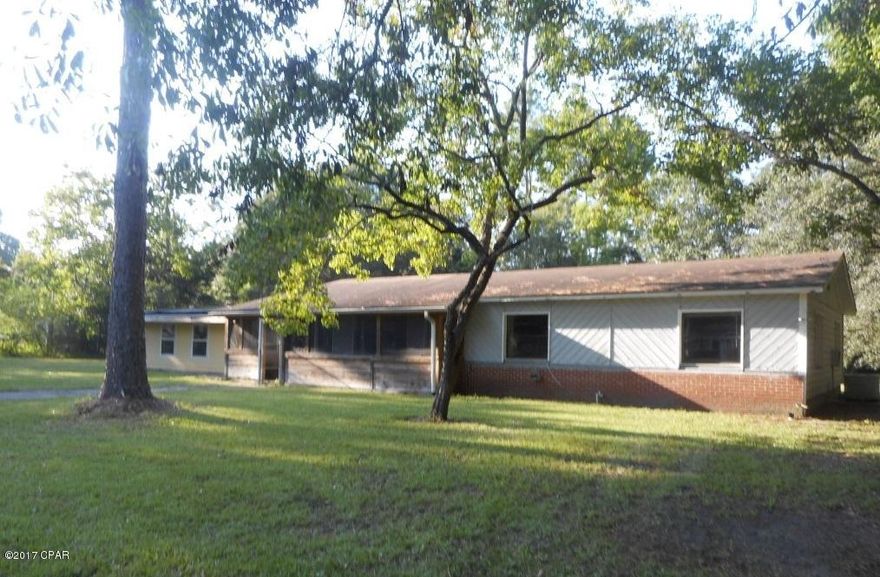 Ranch style home on a large 1/2 Acre+ fenced lot.  3BR/2B plus Bonus room with 1,376 SF H/C and 2500 SF Total. Also the 2 car garage area has been closed in and the interior is ready to be finished.