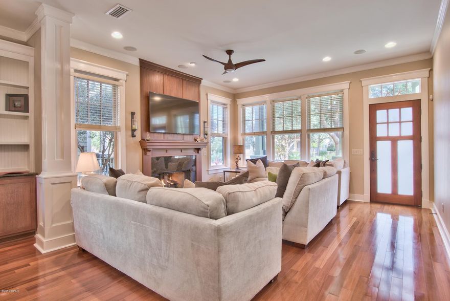 :One of the most sought after locations in the  Exclusive Wild Heron Gated Community.The home is an open plan custom Bungalow with Master on First Floor and 3 additional Bedrooms on second floor.  Total of 3.5 baths Oversized garage w/custom cabinets, pulldown strs. with floored attic and massive additional storage built in. Pool w/hot tub overlook lovely lake Powell. Recently remodeled work out facility  w/Men & Women locker rooms & showers, Nature trails, Golf Course avail for membership, Event lawn w/several activities during the yr. Home recently painted inside and out in the last year. Many upgrades included.  Ready to call home!