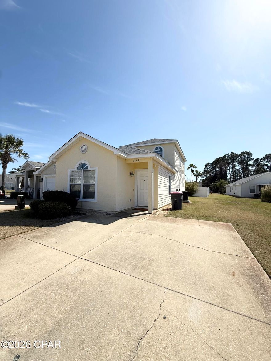 Spacious three bedroom, two and a half bath home centrally located in Palm Cove subdivision on Panama City Beach. Home features large kitchen, first-floor master, oversized mater bath with double vanity, and covered patio. The second-floor has two large bedrooms and a large full bath. One of the bedrooms has french doors that lead to a new balcony. Home has mostly new flooring, mostly new interior paint and new appliances.  Palm Cove has two pools and is centrally located to many beach amenities. HOA include lawn maintenance and security at night. Call to see today before its gone.