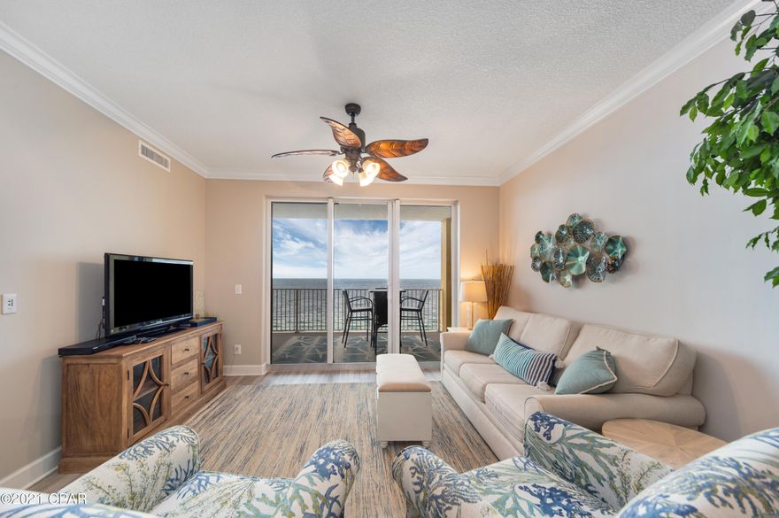 Welcome to Tropic Winds unit #1601. This rare, 2-bedroom, 2 bath unit is located on the east end of the building with unparalleled views of the Gulf of Mexico and coastline of Panama City Beach. Tropic Winds is well known for their huge 10x28 balconies; enough room for the whole family to enjoy the view. The interior of the unit is finely appointed with coastal contemporary décor and updated finishes. The entire condo is equipped with durable luxury vinyl plank floors. No carpet in site. Other upgrades include stainless steel appliances, herringbone tile backsplash, upgraded light fixtures, newer bathroom vanities, and subway tile in both showers. Also, unit #1601 has a dedicated parking to the right of the parking entrance as you enter the resort Tropic Winds is a highly regarded gulf front resort, in the west end of Panama City Beach, which is a less dense and more residential area. However, it is in close proximity to fantastic amenities like Pier Park and Scenic Highway 30A. The resort amenities include a gulf front pool, a separate indoor/outdoor pool, 4 hot tubs, a sauna, a fitness room and a BBQ area. The resort makes an idyllic second home or producing vacation rental. Book your appointment to see this unit today!