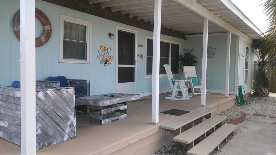 Beautiful Beach House MOVE IN READY! Just a couple of blocks from the Worlds Most Beautiful Beach. This fully furnished unit has everything you need to start loving life just a short stroll to the Gulf of Mexico. Split Bedroom floor plan with 2 full baths make this a very rentable livable set up, perfect for a vacation rental as well. Large open living dining and kitchen area plus a couple of bonus spaces: one at the front door the other is off the large laundry room, this is currently being used as a lockout storage space. Cute tiki bar in big back yard would be a great pool side amenity and there is PLENTY OF ROOM IN THIS BIG BACK YARD FOR A POOL! Nice shade porch across the front of the home with lots of parking for your guests. Sold with all furnishing, currently rented for $875 p/wk.