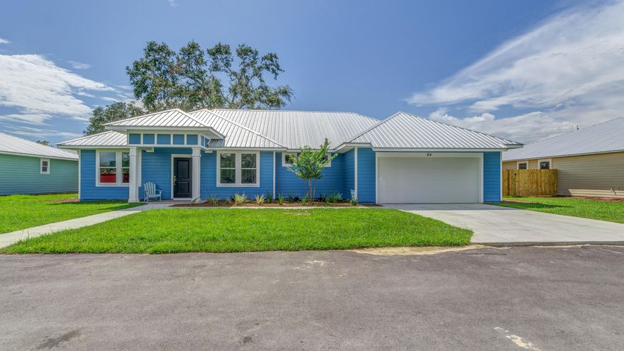 UNDER CONTRACT, ACCEPTING BACKUPS. Gorgeous new home in PURA VIDA! No HOA fees, extra parking for that future boat or camper, 2 car garage, complete landscaping and irrigation, plus room for a pool! Open floor plan, 4 bedrooms, large windows, tile, plank flooring, granite tops, stainless appliances, too! You'll love everything about this home including the designer touches throughout, crown molding, tray ceilings, simply stunning!  Be sure and check out the butler's pantry! Pura Vida is located just a short stroll, bike ride or golf cart drive to the beach and fabulous Pier Park! Builder provides a 10 year home warranty, professional home inspection and wind mitigation reports.  Plus $2,500 towards closing costs!!!  Call your favorite realtor today!