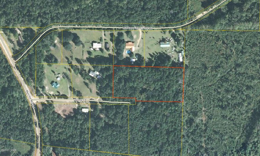 5 acres(mol) close to Marianna.  Good hunting area.  Mostly high and dry.  Has power pole with electricity ran to it. Power is currently off.  There is a sink hole on the property.  Wooded.