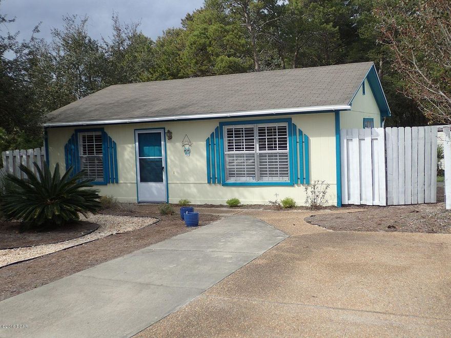 Adorable beach house on the desirable west end of Panama City Beach and just a short walk to the sugar white sands of the Gulf of Mexico. Located in the golf cart friendly neighborhood of Riviera Beach convenient to shopping and entertainment including Pier Park and 30A. Make this darling home your full time residence, second home or a great investment rental property.