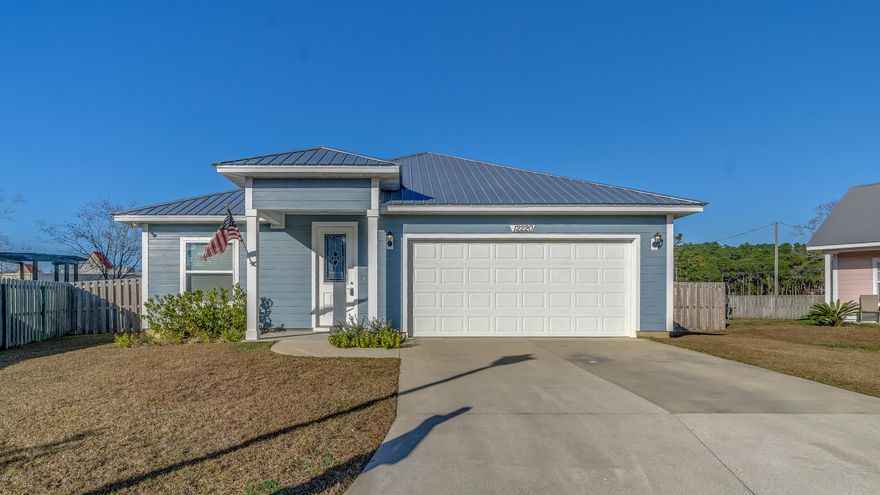 This stunning home is located in the small middle beach community, Lyndell Plantation. You will fall in love as soon as you step inside this new construction home. The entryway has beautiful modern wainscoting, ceramic wood-like tile flooring, 9 ft ceilings throughout making the floor plan open and spacious. The kitchen has beautiful white subway tile, custom wood cabinetry, stainless steel appliances, and is an expansive open floor plan, opening up to the dining and living areas. This home has a split floor plan with a spacious master bedroom and a spectacular master bath with a extra large glass shower and double vanity. Two of the guest bedrooms are jack and jill with a third bonus room that could be used as bedroom or an office.  The backyard is fully fenced with a screened in porchOne of the only neighborhoods in PCB that you can park your boat or full size RV or motor-home behind your own personal fence with no fence height requirement. This home is within walking distance to the beach and library. The neighborhood has a sidewalk that runs to the gulf from the entrance of the neighborhood. You don't want to miss this amazing home! Make your appointment to see it today!