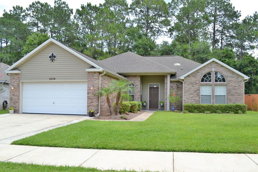 ATTRACTIVE HOME IN CAMRYN'S CROSSING - HEATED SALTWATER POOL!  The interior features 4 bedrooms, 2 full baths, an open split floor plan, high ceilings, tile and bamboo wood flooring in the main living areas, carpet in the bedrooms, an interior laundry room and a 2 car garage. The kitchen boasts solid surface counter tops, stainless steel appliances, a pantry and an adjoining breakfast area. The living room has a vaulted ceiling, a gas fireplace with mantle, is wired for surround sound (also wired in the Screened Porch) and is open to the dining room and foyer. The 15x12 master bedroom has an XL fan for maximizing coolness and an adjoining bath with counter height vanity with double sinks, a 2 person soaking tub, a separate shower and a large walk-in closet. The other 3 bedrooms are good size and share a hall bath. Bonus Interior Features: Security System (not currently monitored), Nest Thermostat, New Gas Water Heater (2017), Crown Molding and Chair rail. The exterior features a screened-in porch, a heated saltwater pool, a 10x12 shed/workshop with electric, an open pool deck and patio, a privacy fenced backyard and a sprinkler system (using reclaimed water). This home backs up to a conservation so the backyard has ample privacy. Camryn's Crossing is a sidewalk community with underground utilities and is located in an excellent school zone. HOA fees are $185 per year. Call today for your own private preview. All information derived from seller and public record, buyer to verify. Measurements approximate.