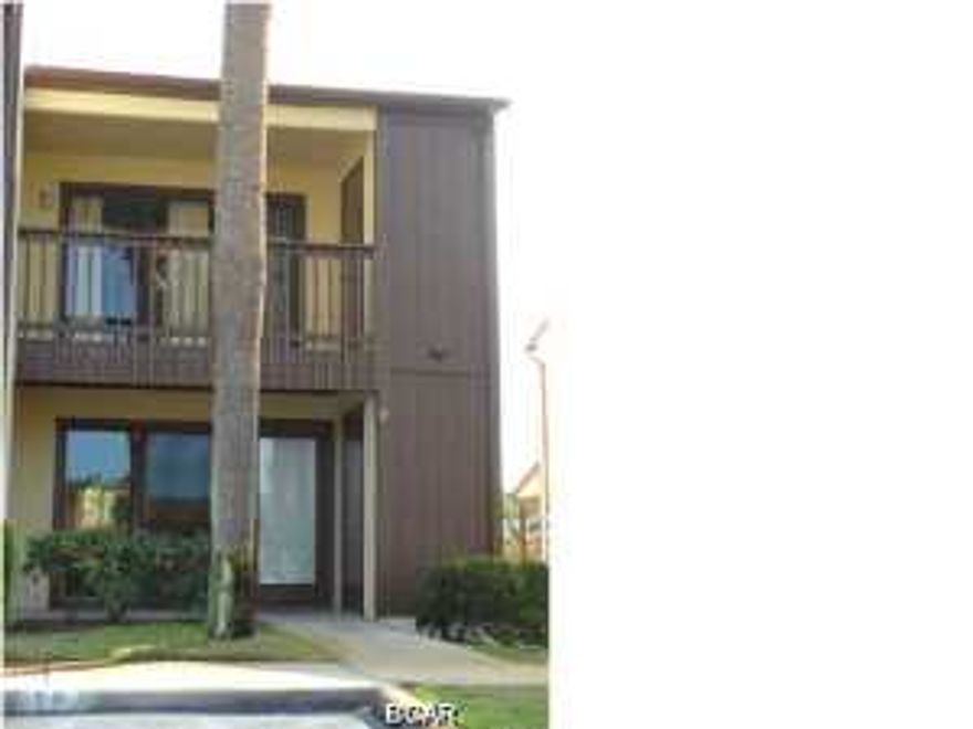 It's a blank slate; freshly painted and emptied for YOU, ready to live in or rent out! This CORNER unit features a private, favorable location, within the coveted Beachwalk community. This quiet, West End community offers a pool, clubhouse, tennis courts, shuffleboard, common ground, lush landscaping, and a pathway to the World's Most Beautiful Beaches. Wonderful two-story condominium unit, walking distance to the World's Most Beautiful Beaches! The first floor features an enormous living room, kitchen, built-in bookcase, full bathroom with stand-up shower, and back door, leading to the back porch & yard. Moving upstairs, there are two bedrooms, one bathroom, a private vanity space, washer/dryer space, water heater, and balcony. There are two outdoor closets (one at the front door &