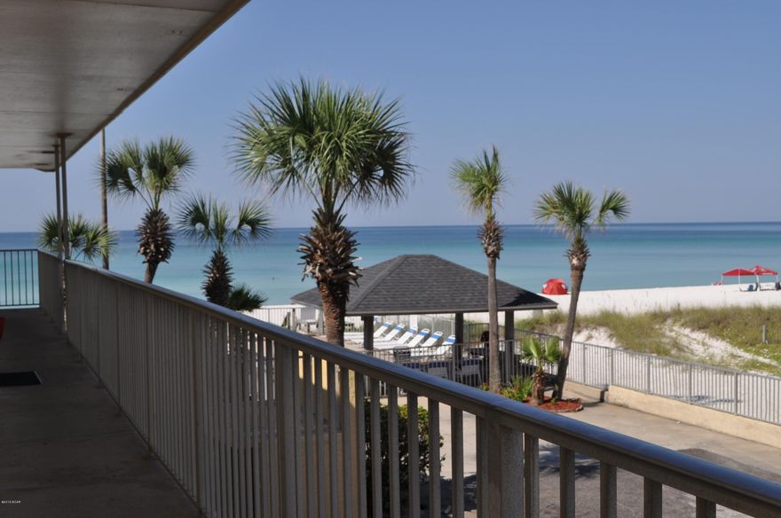 Gulf views from this 1BR/1BA Ocean Terrace condo!  Furnished and rental ready, this is an excellent rental investment.  The unit is just steps from the gulf side pool and the sugar white sandy beach.  Ocean Terrace is walking distance to several restaurants and attractions and you're only a 5 minutes drive to St. Andrews State Park and shopping centers.  All info is approx. and must be verified by Buyers if important.