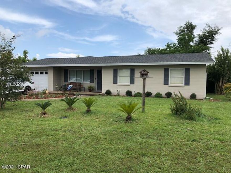 Central Lynn Haven on a corner lot! This home has 3 bedrooms and 2 baths.  You won't believe the open space in the great room, dining room and kitchen.  Beautiful fireplace in the great room with french doors leading to the patio and fenced backyard.  So much has been updated; from floors to roof,  a/c, kitchen counter tops, cabinets and appliances, main bedroom shower has been recently tiled as well as new plumbing.  Nice indoor laundry and storage. Come and see for yourself.  Outside the backyard is fenced and has a nice patio and large work shop with electricity.  Currently under contract; seller accepting back up offers.