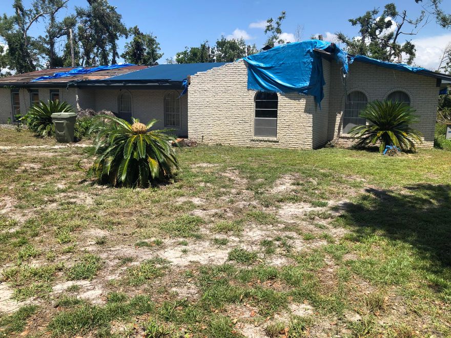 CURRENTLY UNDER CONTRACT, SELLER ACCEPTING BACKUP OFFERS-This house was a one owner house. Due to Hurricane Michael, moving on.  The house has been mitigated, and has sustained a good bit of damage to the brick, roofing system, etc. BUT the property once cleaned up is gorgeous and comes with a separate smaller (50 x 150) lot next door with an acceptable offer.  There is approximately 1+acre total.  The lot the house sits on goes down to the creek.  Please be cautious walking the property. Still trees down in the back of the property.  Measures are approximate...if important please measure.