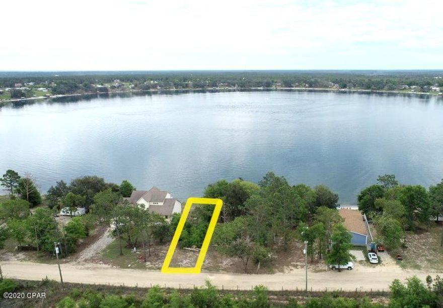 Rare find with this vacant waterfront lot on the highly sought-after Crystal Lake. Whether you like fishing, boating, skiing, kayaking or laying out on the white sandy beaches this gem is sure to provide years of entertainment for friends and family. Enjoy sunrise views from the back porch of your dream house or mobile home. Property is located approximately 30 minutes from Panama City Beaches, restaurants and Interstate 10.