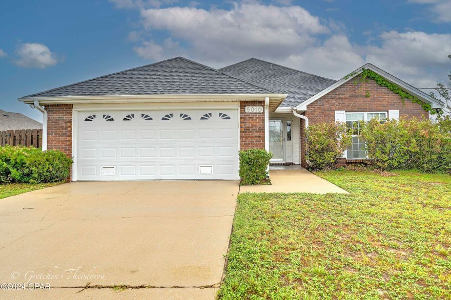 This is a great 3 bedroom/ 2 bath home sitting on a third of an acre lot located in the Cherokee Heights neighborhood. This home features a wood burning fireplace, spacious screened in patio, LVP floors, two car garage with a sectioned off area that can be used an additional work space, stylish crown molding, and an Extra Large master bedroom with 8x8 walk in closet. The master bedroom is also complimented by a master bath with a separate shower, and a jetted tub shower combo. The living area has a great flow into the kitchen and dining area. The exterior of the home is brick with vinyl accents accompanied by a HUGE  backyard that has privacy fenced all the way around. This home is NOT located inside of an HOA so the yard is definitely wide enough to fit a large boat or RV along the side. This home is currently occupied so please reach out to the agent to schedule a showing. Motivated seller open to consider all reasonable offers! Let us make this your next Home!