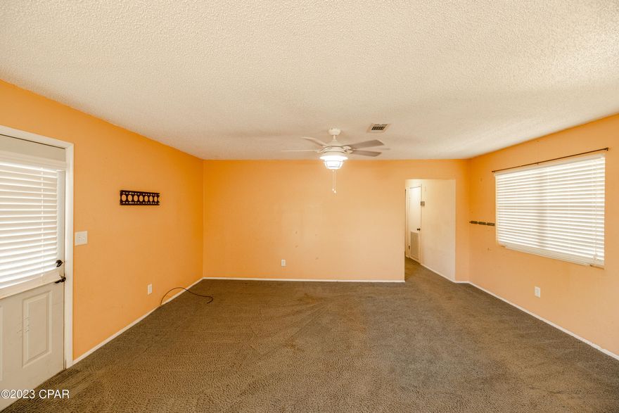 CURRENTLY UNDER CONTRACT, SELLER WILL CONSIDER BACKUP OFFERS. Come see the potential in your future home! Could be a perfect investment for rentals or a perfect fixer upper to call home. You'll find it needs some TLC and cosmetic updates but all major components are done for you to come in and finish out as you like. This 3 bedroom 2 bath home provides an open floor plan as you walk in the front door. Washer & Dryer convey and updates feature a tankless water heater & HVAC system that easily supplies the home in comfort and hot water to spare! Metal Roof installed in 2013!  N Cedar Lane is centrally located to the main roadway points of Bay County and offers convenient access to schools; TAFB; business and dining locations ect. You'll also notice this home sits on a larger than average lot to accommodate your outdoor lifestyle of choice. This property will convey 2 oversized sheds in great condition, one with power and both providing plenty of storage space for your family needs.